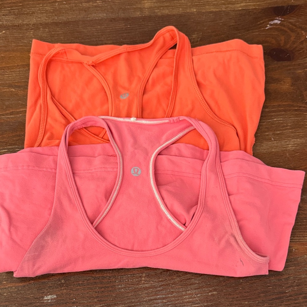 lululemon athletica Racerback Sports Bras in Coral Pink & Bright Orange